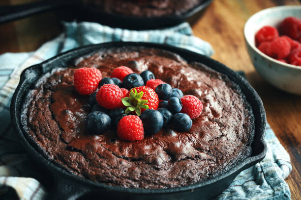 istock Cast Iron Chocolate Brownies with Berries 1333243854