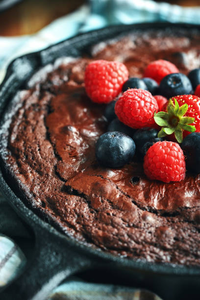 istock Cast Iron Chocolate Brownies with Berries 1333244442