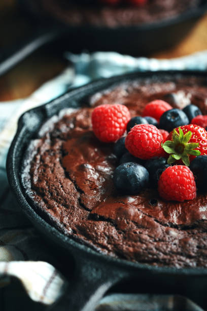 istock Cast Iron Chocolate Brownies with Berries 1333244517