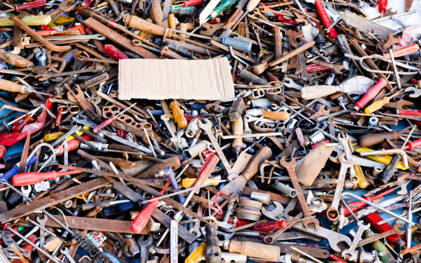 pile of old rusty tools at the flea market, hand work tools, street sale of screwdrivers, pliers, wrenches. Set of mechanical tools for manual work pile of old rusty tools at the flea market, hand work tools, street sale of screwdrivers, pliers, wrenches. Set of mechanical tools for manual work outdoor selling purchase of steel scrap stock pictures, royalty-free photos & images