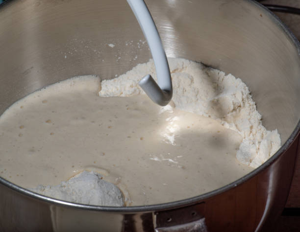 istock Mixing Sourdough starter yeast sponge to make bread 1333248281