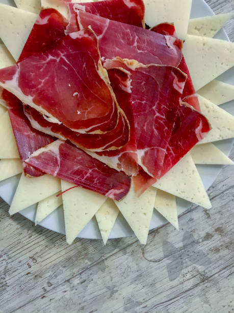 istock ham and cheese counted in slices and presented in a ceramic plate 1333250577