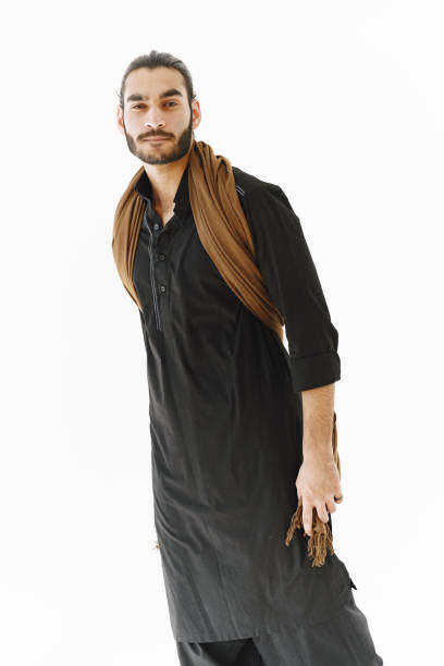 istock Young muslim man posing casually over white wall. Studio, isolated 1333255976
