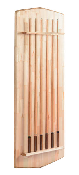 Wall wooden pool cue holder with six cues isolated
