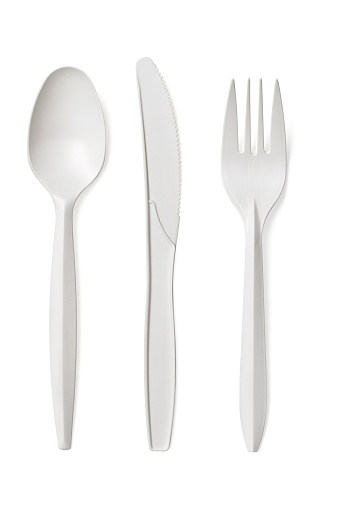 Set of plastic disposable tableware isolated