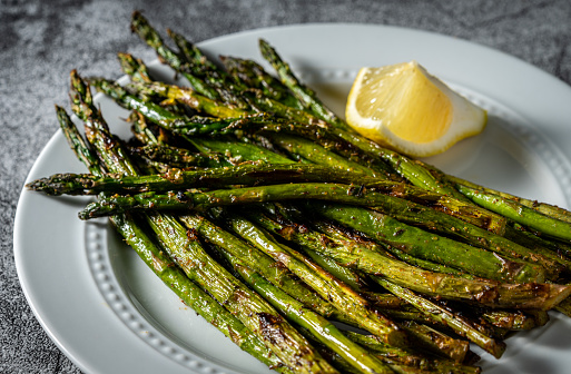 Grilled Asparagus spears on serving dish.