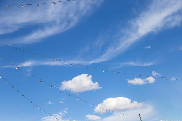 istock Clothesline with lights off with sky. 1333260335