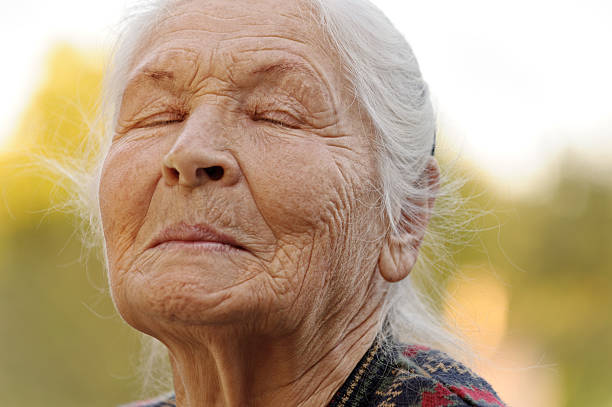 istock The elderly woman with closed eyes 133326137