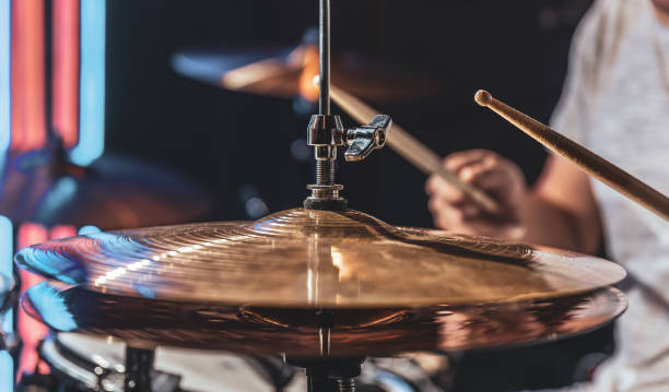 istock A male drummer plays drums with special drum sticks. 1333264034
