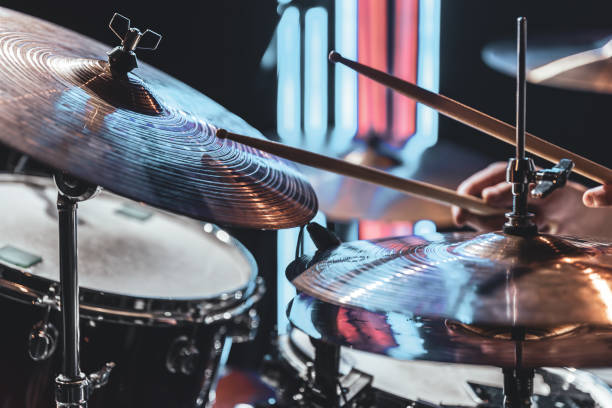 istock Close up the drummer plays drums with drum sticks. 1333264038