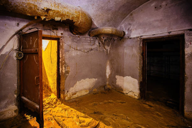 opened heavy steel armored hermetic door in the soviet bomb shelter - lock door horror gate imagens e fotografias de stock