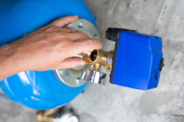 istock Pumping station. Installation of a water supply system in a residential building using a hydraulic accumulator 1333267963