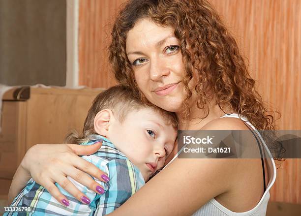 Mother Holding Her Son Stock Photo - Download Image Now - Consoling, Mother, 4-5 Years