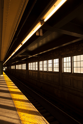 Sunlight shining into a subway station in New York City.