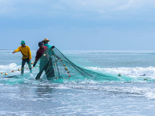 fishers at the beach during pandemics on chachalacas, Veracruz, Mexico march 20th 2021