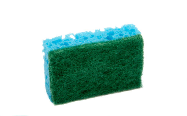 istock Kitchen sponge for dish isolated on the white 1333271395