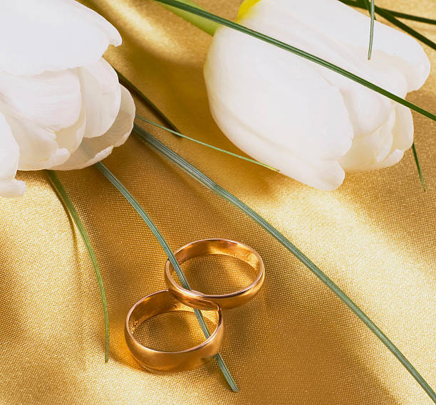 istock Wedding rings and flowers 133327600
