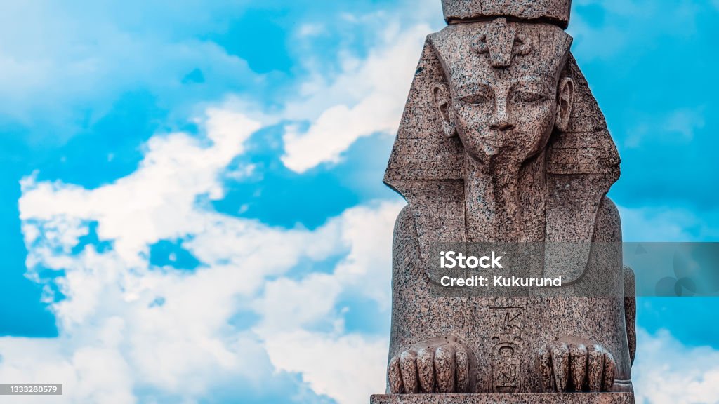 Ancient Egyptian Sphinx of Amenhotep III  located in S-Petersburg Russia. Wide 16:9 image  panorama against the blue sky, copy space. Amenhotep III Stock Photo
