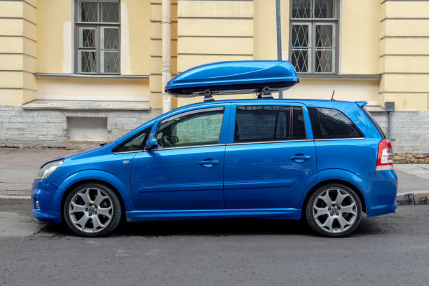 Beautiful sky blue Opel Zafira OPC parked at street of Saint-Petersburg, Russia, 01 August 2021. Side view. stock photo