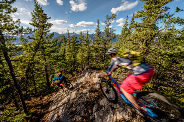 istock View of mountain bikers descending rock slab 1333281282