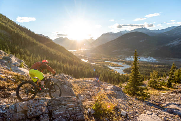 istock View of mountain biker descending mountain ridge 1333281388