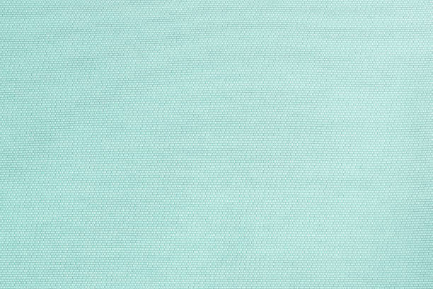 istock Cotton silk blended fabric wall paper texture pattern background in pastel white pale green blue mint color 1333283613