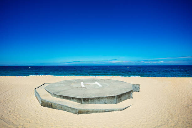 istock Heliport view on the sand beach over blue ocean 1333284442