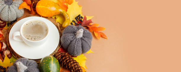 istock Autumn flat lay composition with dry leaves wreath frame and coffee latte cup on neutral beige background. Creative autumn, thanksgiving, fall, halloween concept. Top view, copy space, seasonal menu 1333286673