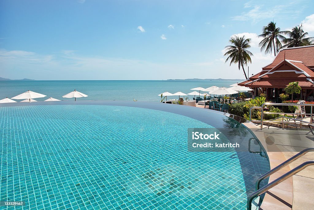 Tropical resort in Thailand. Tropical resort. Poolside with beautiful sea view in Thailand. Tourist Resort Stock Photo