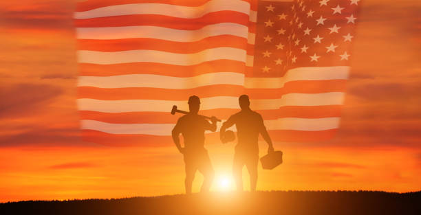istock Worker on the USA flag background . Labor day holiday concept. 1333295255