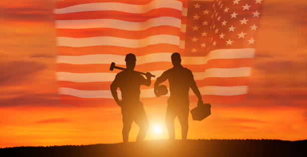 istock Worker on the USA flag background . Labor day holiday concept. 1333295259