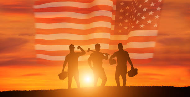 istock Worker on the USA flag background . Labor day holiday concept. 1333295268