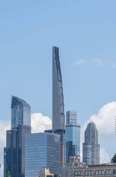 Vertical view of 111 West 57th Street, also known as Steinway Tower, is a supertall residential skyscraper in the Midtown Manhattan neighborhood of New York City New York, NY - USA - July 30, 2021: Vertical view of 111 West 57th Street, also known as Steinway Tower, is a supertall residential skyscraper in the Midtown Manhattan neighborhood of New York City logan west stock pictures, royalty-free photos & images