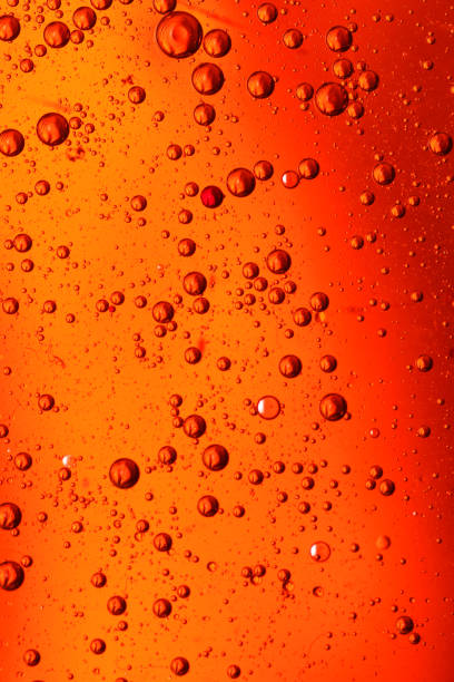 istock oil bubbles with water on glass 1333302008
