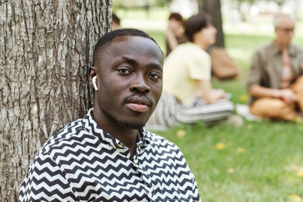 istock African man sitting in the park 1333312035