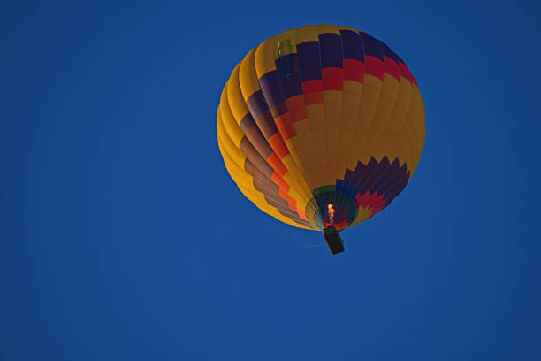 Blurred People Against Hot-Air Balloon