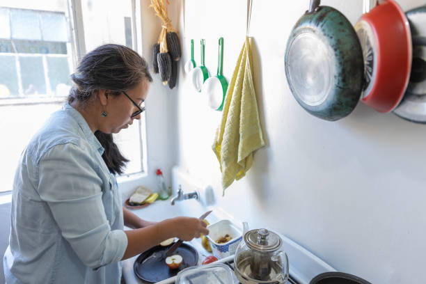 istock Mexican real woman cooking in the kitchen 1333313921