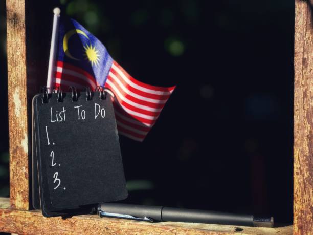 istock Flag with black spiral note written text 