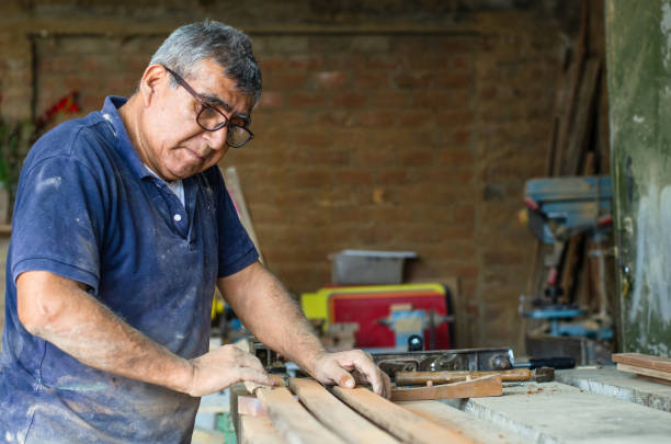 The elder or senior learn new skills, Learn to become a carpenter. stock photo