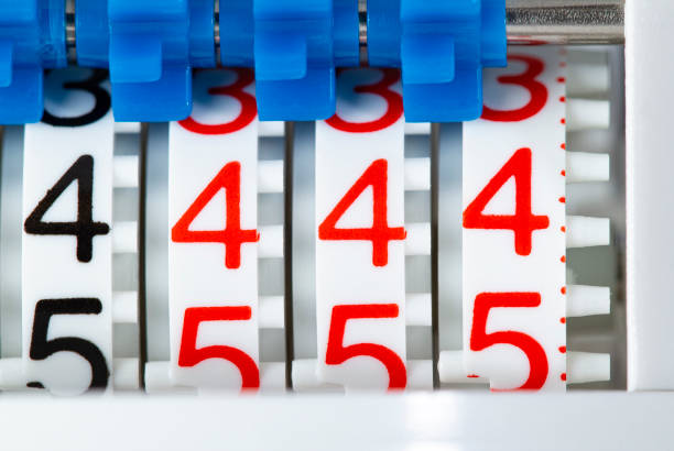 istock Rows of digits numbers four and five on a water meter close-up. 1333321131