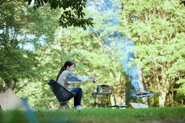 Young Japanese Woman Do Solo Camp Young Japanese Woman Do Solo Camp solo performance stock pictures, royalty-free photos & images