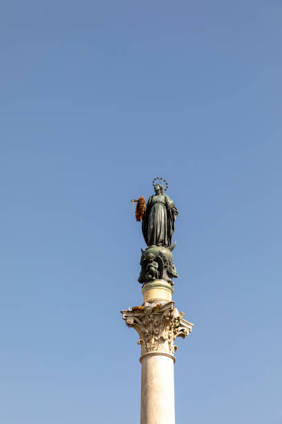 istock Column of the Immaculate Conception, is a nineteenth-century monument depicting the Blessed Virgin Mary, located in Piazza Mignanelli and Piazza di Spagna. Rome, Italy. 1333328028