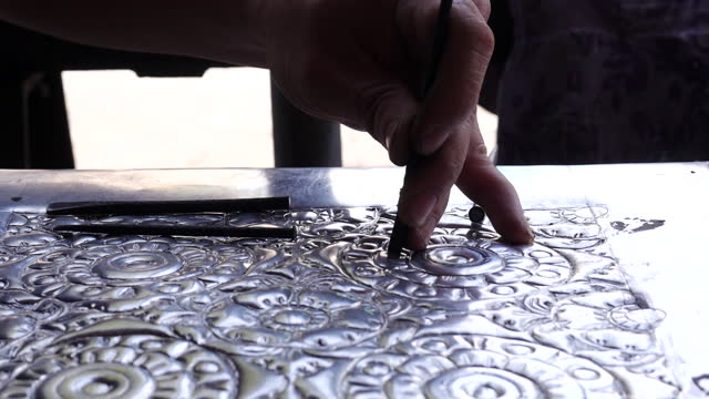 Sheet metal engraving work. Thai handicrafts.