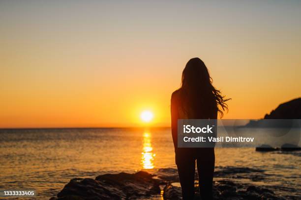 Breathe In Breathe Out Stock Photo - Download Image Now - Contemplation, Sunset, One Woman Only