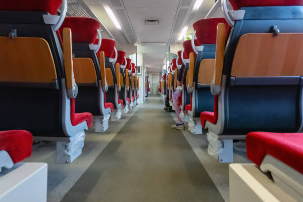 Empty train seats. No people inside the train wagon. Empty train seats. No people inside the train wagon. train interior stock pictures, royalty-free photos & images