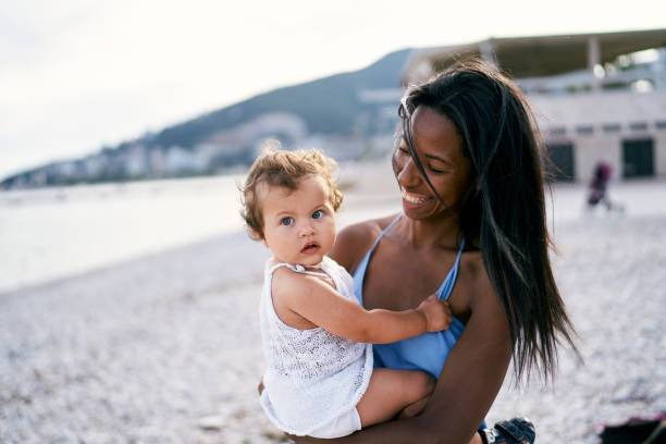 istock Mother And Son At Beach 1333343798