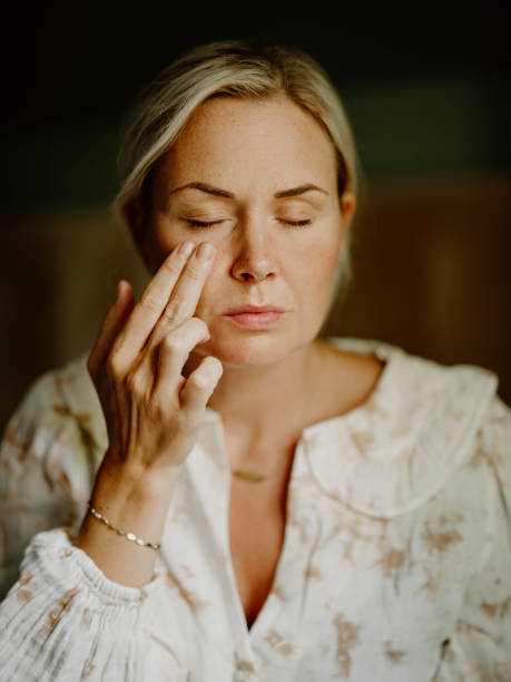 istock Woman doing practising tapping meditation self care 1333352698