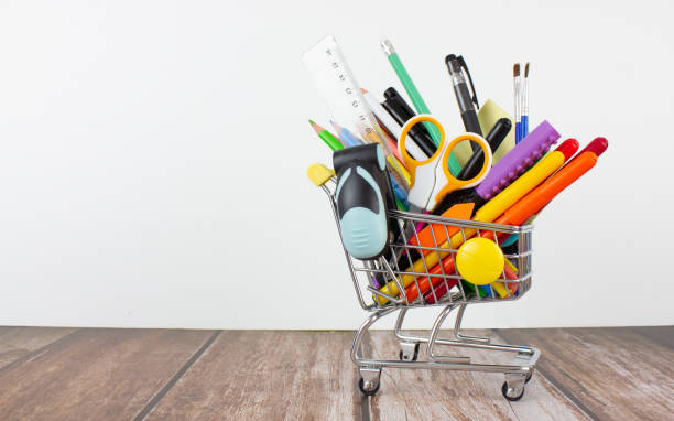 Stationery in a shopping cart. Copy space. Back to school Stationery in a shopping cart. Copy space. Back to school. paper stock stock pictures, royalty-free photos & images