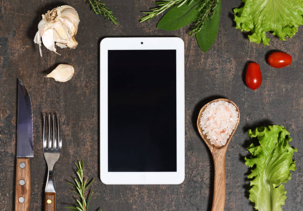 istock Tablet mock up with food ingredients 1333354385