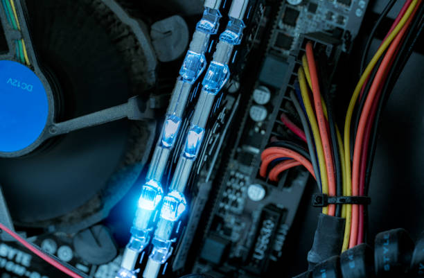 istock RAM memory in computer motherboard. Inside desktop PC plenty of dust. Dirty PC need to clean. PC system. Computer hardware. Electronic chip. PC RAM, fan, and cable wire in CPU of desktop computer. 1333355509